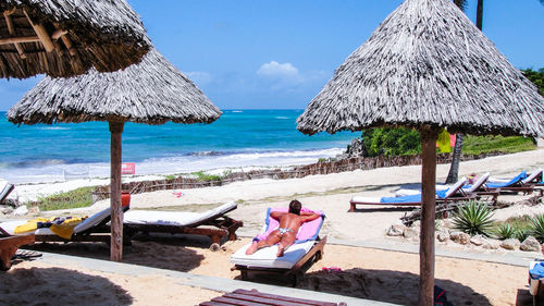 Scenic view of beach against clear sky