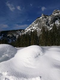 Snow covered mountain against sky