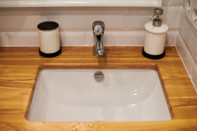 High angle view of faucet in bathroom