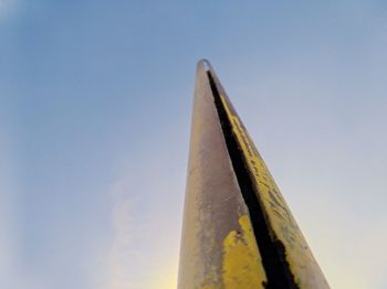 Low angle view of metal against clear sky