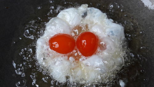 High angle view of ice cream in water