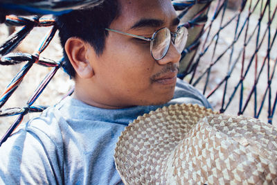 Close-up portrait of man wearing hat