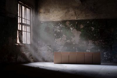 Cardboard boxes in old room