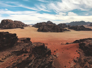 Rock formations in desert against sky