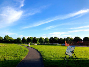 Scenic view of park against sky