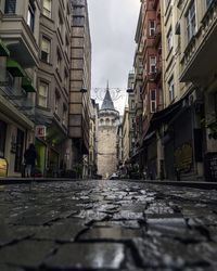 Street in city against sky