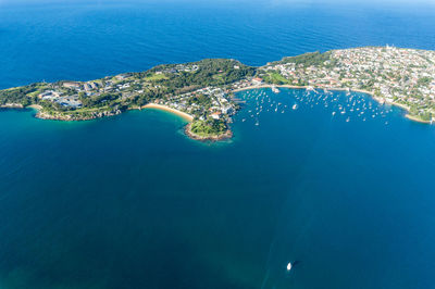 High angle view of sea and cityscape