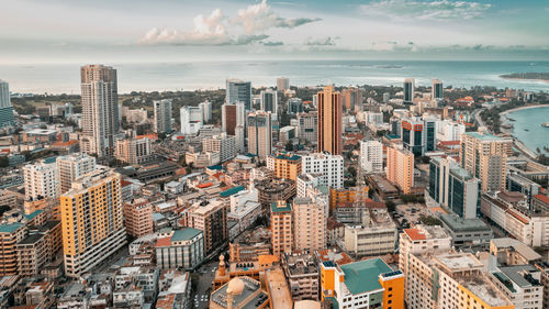 Aerial view of cityscape against sky