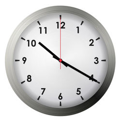 Close-up of clock over white background