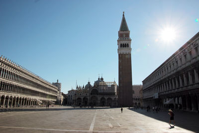 Low angle view of san marco campanile at piazza san marco against sky