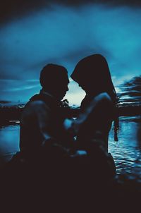 Couple kissing in lake