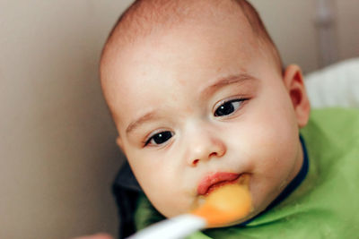 Close-up of baby eating food