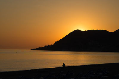 Scenic view of sea at sunset