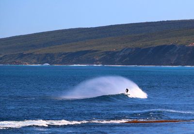 Scenic view of sea against clear sky