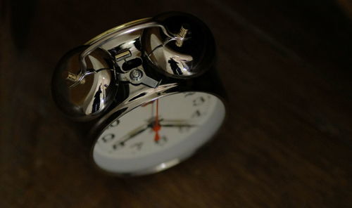 Close-up of navigational compass on table