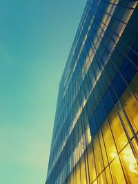 Low angle view of skyscraper against clear sky