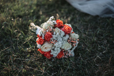 High angle view of rose bouquet on field