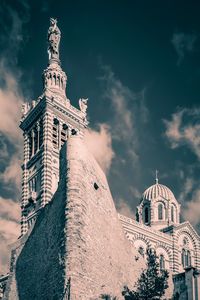 Low angle view of temple building against sky