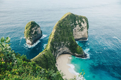 High angle view of rocks on sea