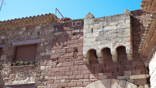 Low angle view of historic building against sky