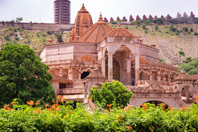 Artistic red stone jain temple at morning from unique angle