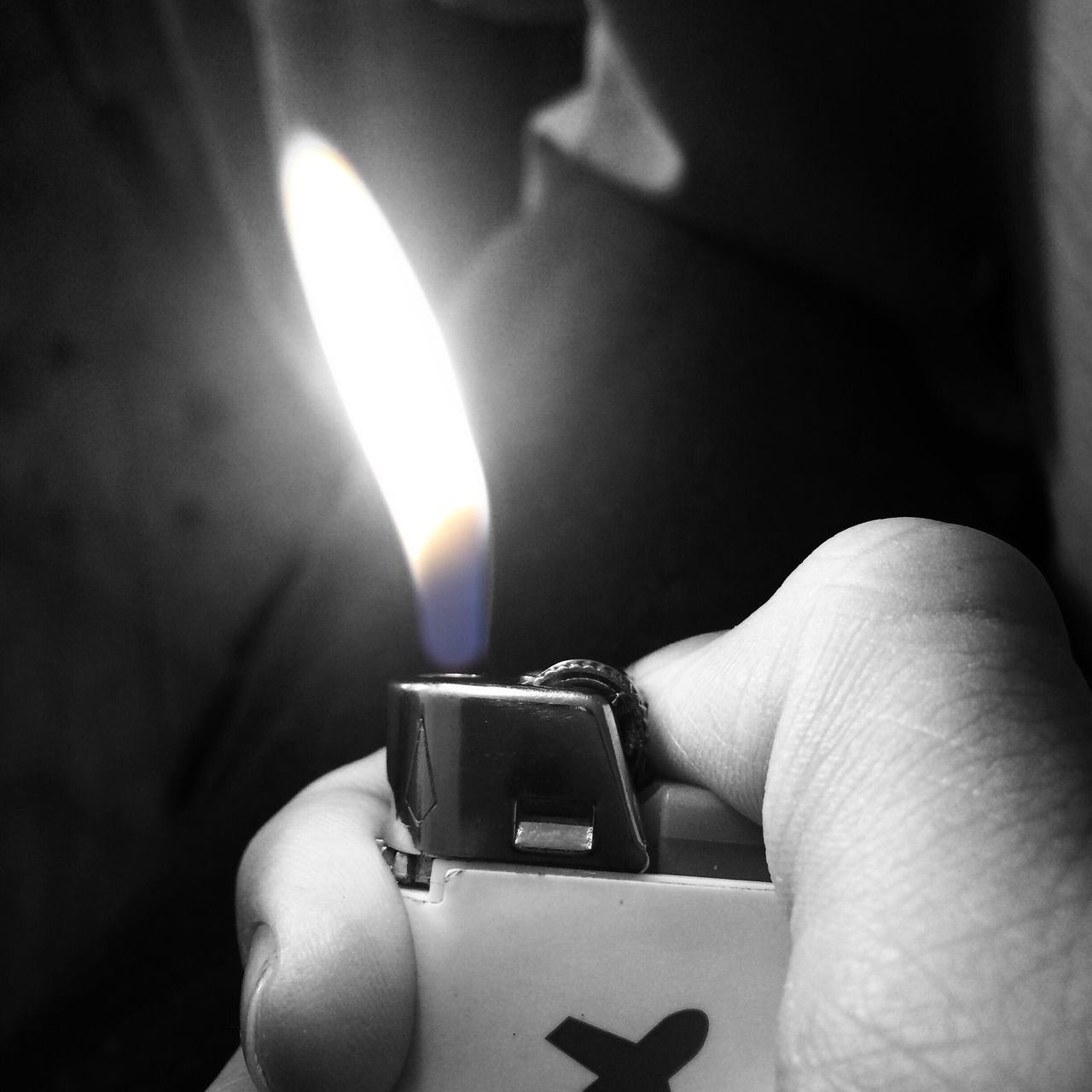 human hand, human body part, one person, burning, holding, human finger, flame, cigarette lighter, close-up, indoors, real people, heat - temperature, focus on foreground, lifestyles, night, adult, people