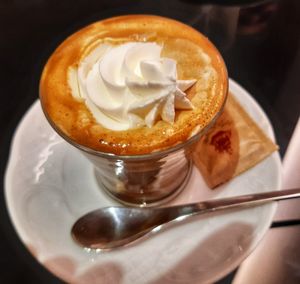 Close-up of cappuccino on table