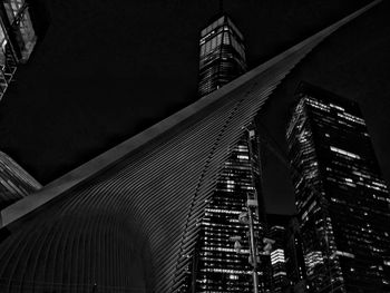 Low angle view of modern building at night