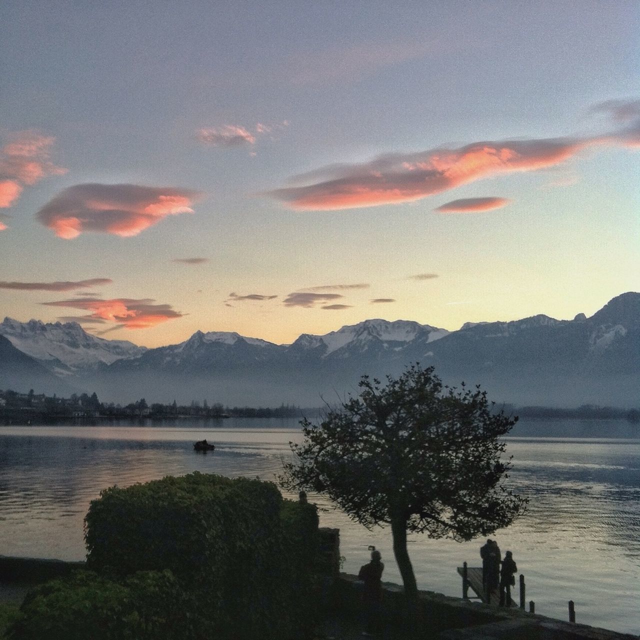 sunset, water, silhouette, scenics, sky, mountain, tranquil scene, beauty in nature, tranquility, leisure activity, sea, nature, lifestyles, lake, men, tree, idyllic, beach, cloud - sky