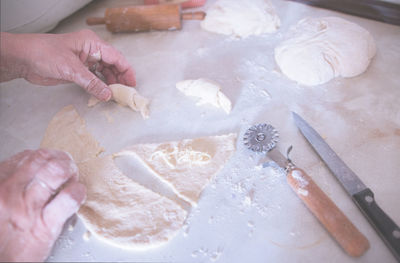 Person preparing dough