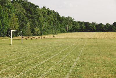 Markings on playing field against sky