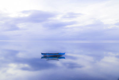 Airplane flying against sky