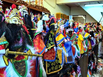 Multi colored umbrellas for sale in market