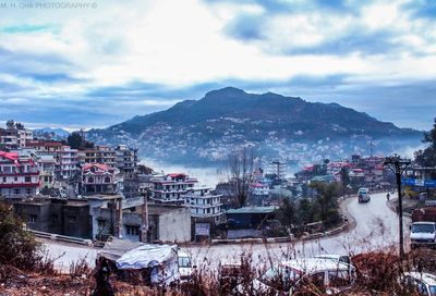 High angle shot of townscape against sky