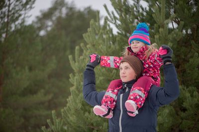 Brother and sister in forest