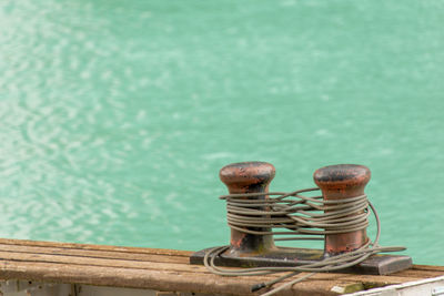 Close-up of rope on pier