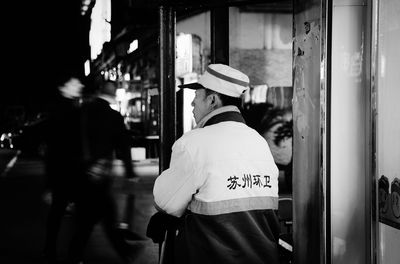 Woman standing in city