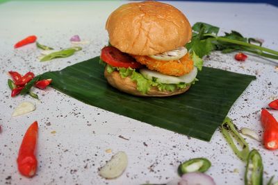 Close-up of burger in plate on table