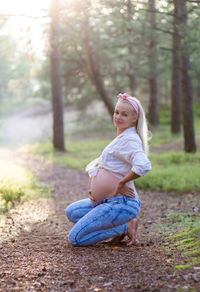 Young woman in forest