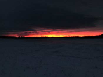 Scenic view of silhouette landscape against sky during sunset