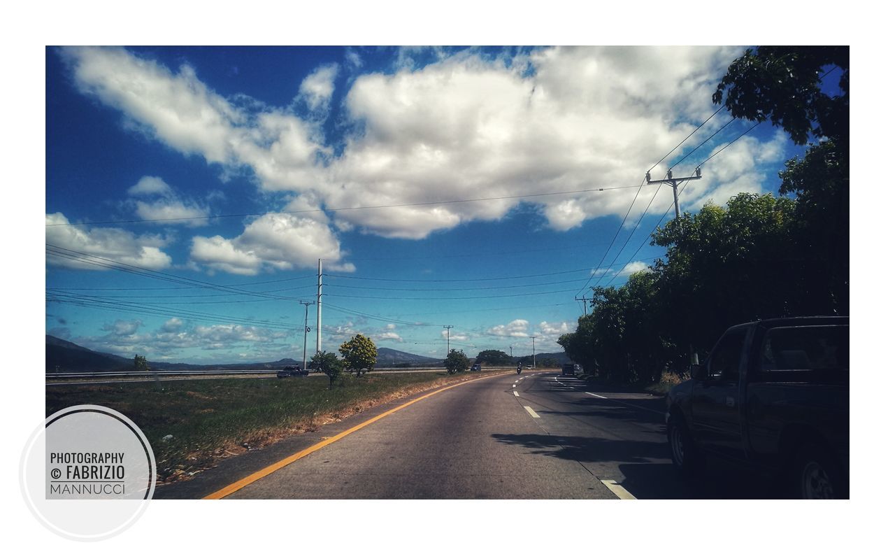 road, transportation, cloud - sky, road marking, sky, the way forward, tree, day, no people, land vehicle, outdoors, nature