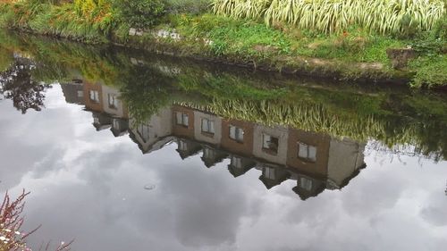 Reflection of buildings in calm water