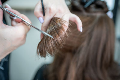 Midsection of woman with hair