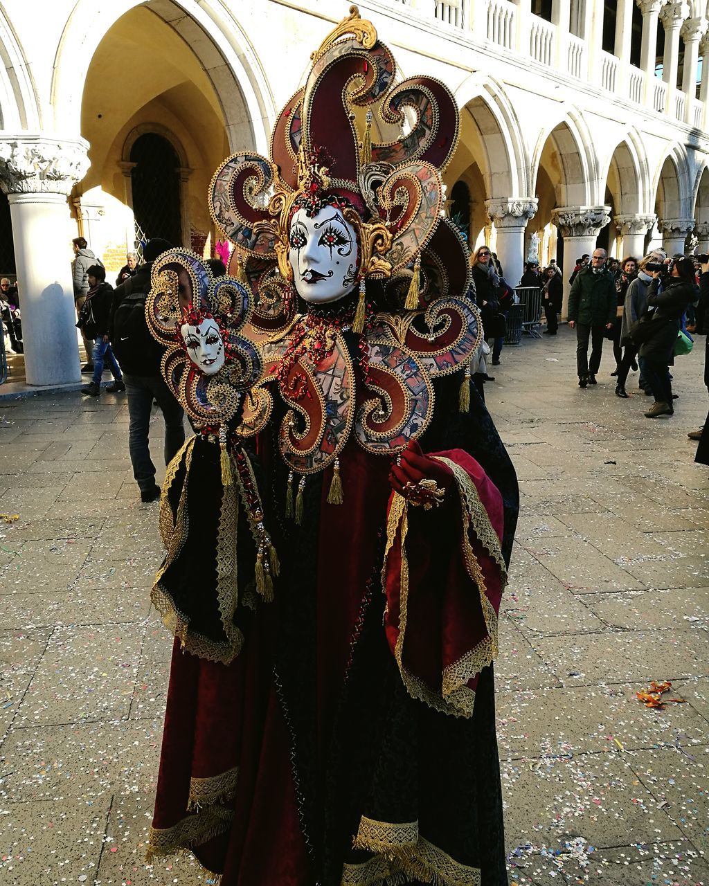 celebration, real people, parade, mask - disguise, large group of people, men, outdoors, architecture, adults only, venetian mask, people, crowd, day, adult, participant