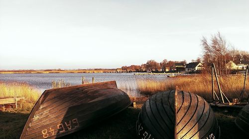 Calm lake against clear sky