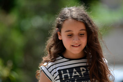 Portrait of smiling girl outdoors