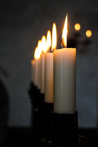 Close-up of burning candles