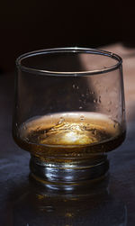 Close-up of beer glass on table