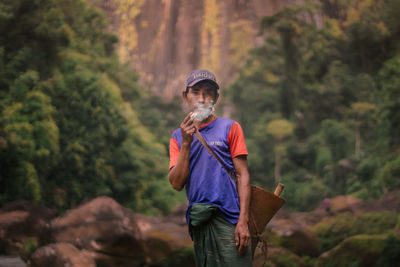 Man standing in a forest