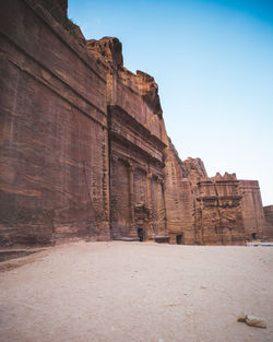 Low angle view of old ruin building against sky